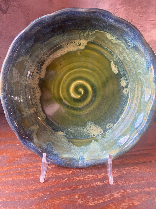 Deep stoneware pie or casserole dish.