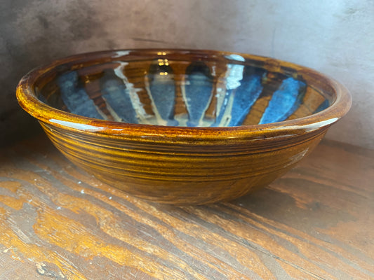 Brown and blue glazed large pottery serving dish.