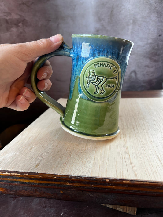 Pennsic Ceramic mug with a butt trumpet medallion