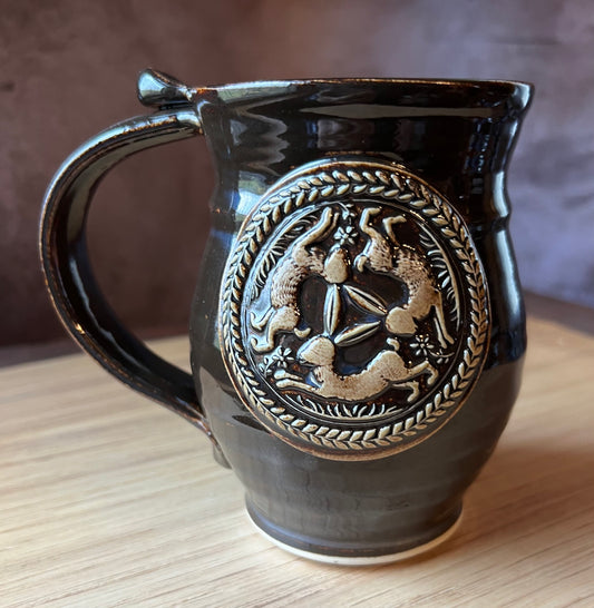 Three hares is an ancient circular motif featuring three hares chasing each other, sharing only three ears between them, yet appearing to have two ears each.