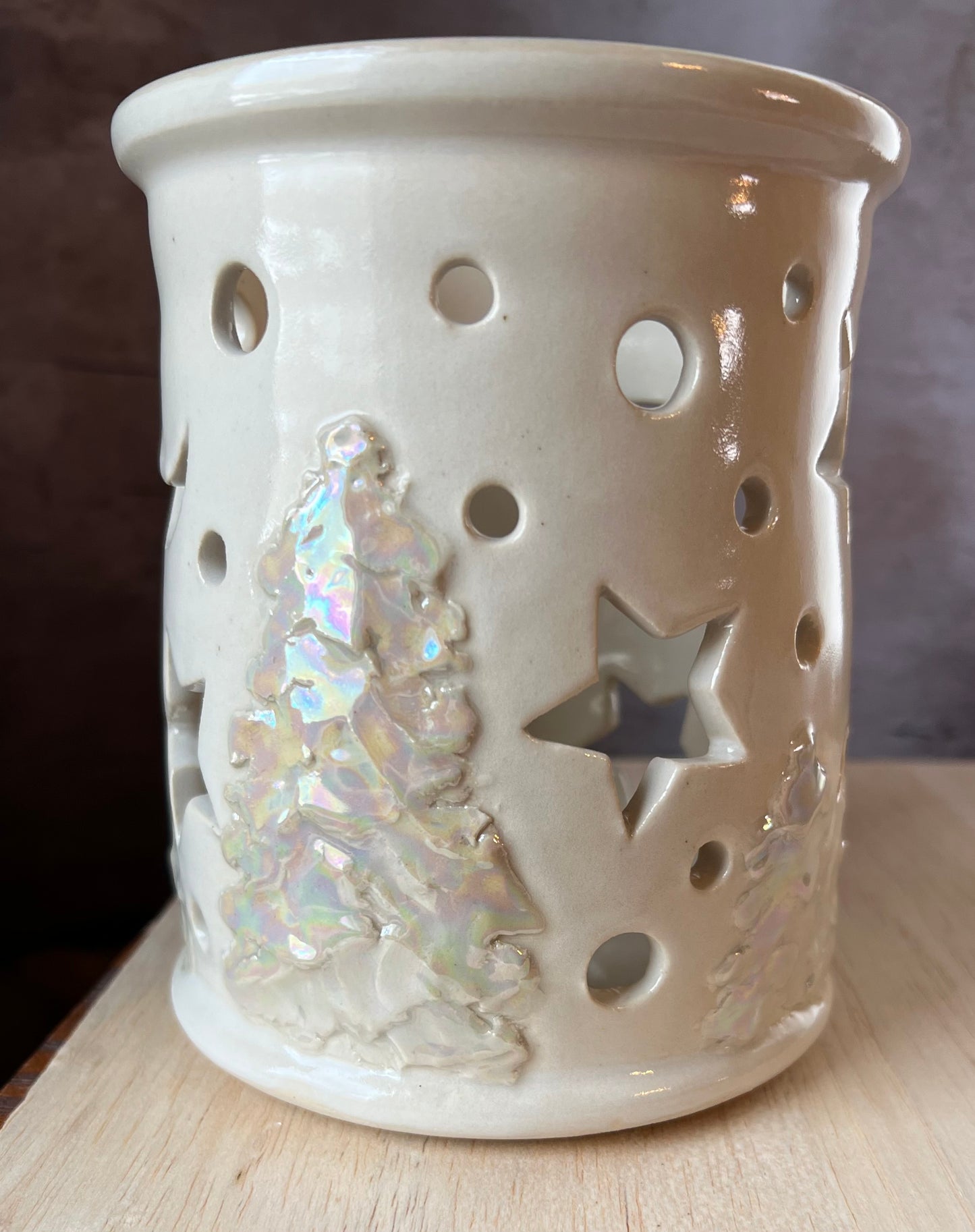 Ceramic candle holder, lantern with ivory pearl tree and cut out stars and circles.