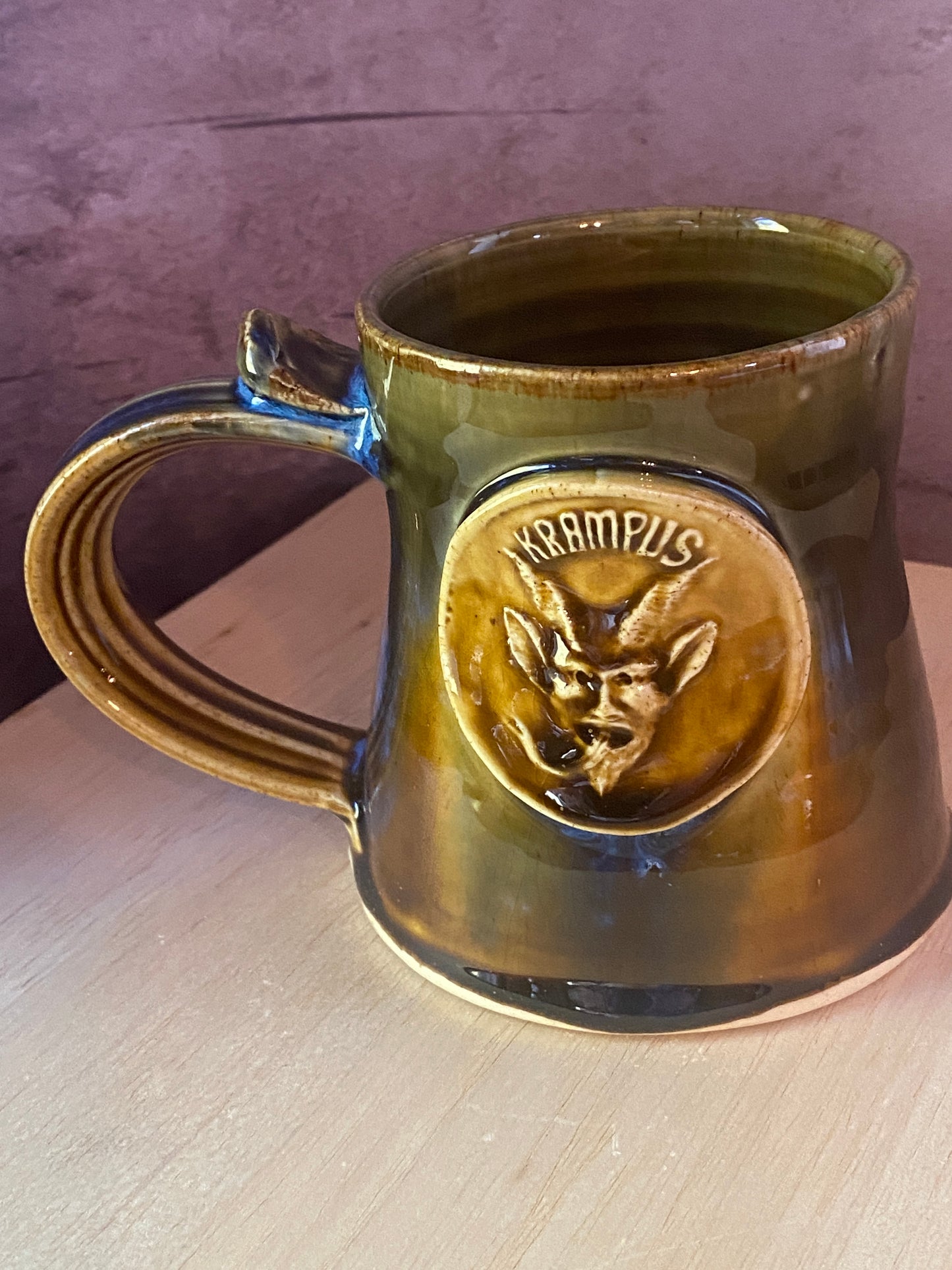 Golden blue mini mug with Krampus face