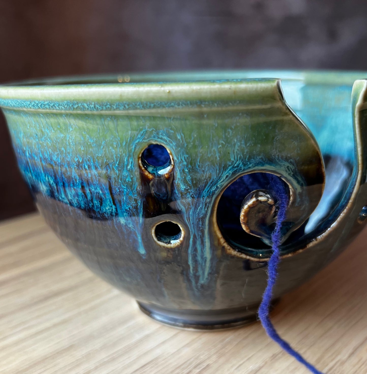 Handmade yarn bowl for knitting, crocheting or other yarn arts. Hand thrown and cut bowl designed for holding yarn while working.