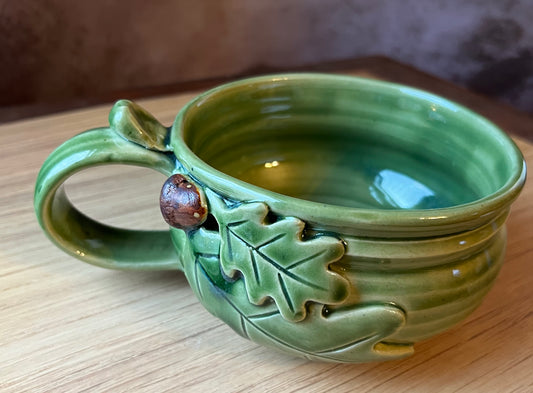 Custom soup bowl with oak leaves and acorn in green glazed pottery
